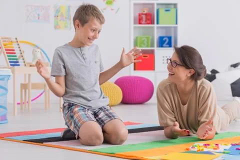 Private tutor working with child Stock-Fotos