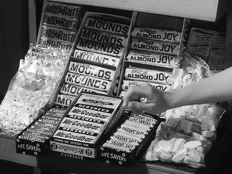 A private in the Women's Army Corps eats a candy bar and an overweight Stock Footage 75285441