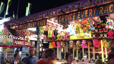 Prizes lighting up at fair Vídeos de archivo 73431164