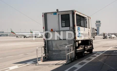 PRM passenger mobility assistance vehicle at airport runway Stock Photos