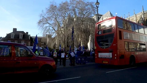 Pro-EU protesters demonstrating outside Parliament in London 스톡 동영상 126215423