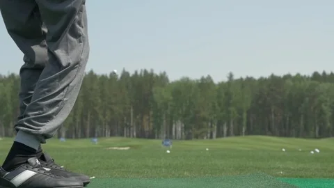 Pro golf player shot ball from sand bunker at course. Section of man playing Stock Footage