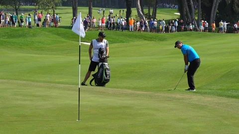 Pro golfer on a world class golf course Stock Footage 122576227