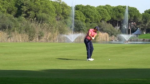 Pro golfer on a world class golf course Stock Footage 122620381