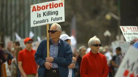 Pro Life Protestors - Elderly Couple Protesting on Parliament Hill Canada Stock Footage 37875339
