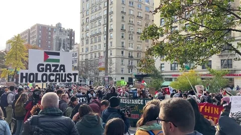 Pro-Palestinian protesters chanting in front of Columbia University Stock Footage 255754084