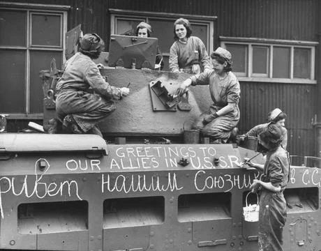 Pro-Russian sentiments being painted on the side of a tank being sent to the Rus Stock Photos