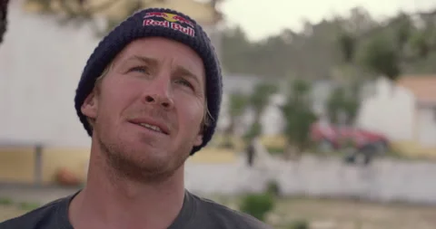 Pro surfer Andrew Cotton talks about three things to be found in his car Stock Footage 157110356