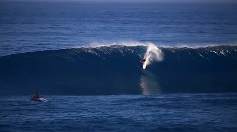 Pro Surfer Catching a Huge Wava at Jaws - Slow Motion Stock Footage 39490079