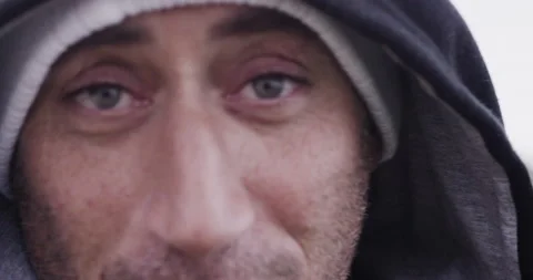 Pro surfer David Langer looking into distance thoughtfully and talking to camera Video stock 163055622