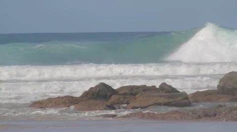Pro Surfers paddling out to at Snapper Rock during Cyclone Winston swell Stock Footage 61852041