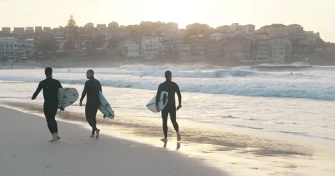 Pro surfers walking with pride at Bondi beach Sydney in slow motion Stock Footage 142177946