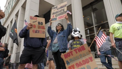 Pro Trump Protest During Lockdown - Anti Bill Gates Stock Footage 130155249