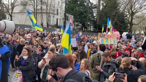 Pro Ukraine protesters at demonstration, march to the Russian Embassy in London. Stock Footage 302832922