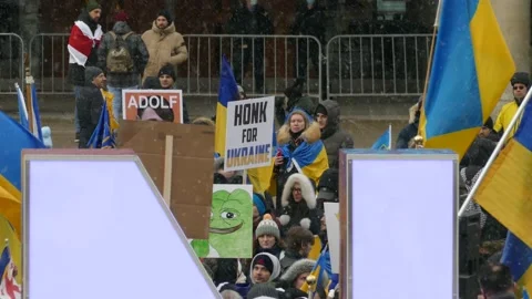 Pro Ukrainian Protest Rally Taking Place At Nathan Phillips Square in Stock Footage 171264694