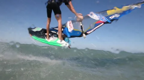 Pro Windsurfer is doing high Trick Stock Footage 58572820
