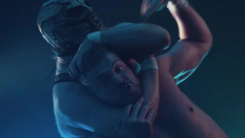 Pro wrestling match headlock close up Video stock 336802409
