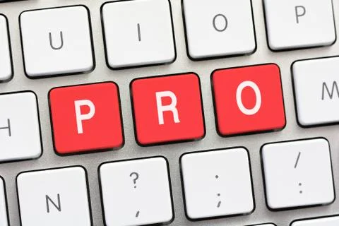 PRO writing on white keyboard Stock Photos