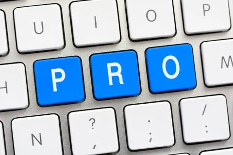 PRO writing on white keyboard Stock Photos
