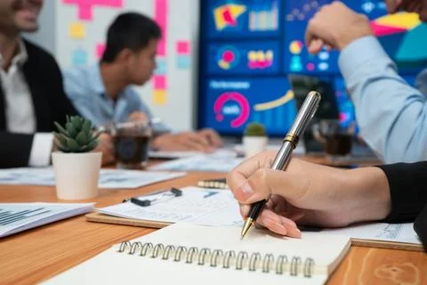 Proactive office worker participating in productive business meeting. Habiliment Stock Photos