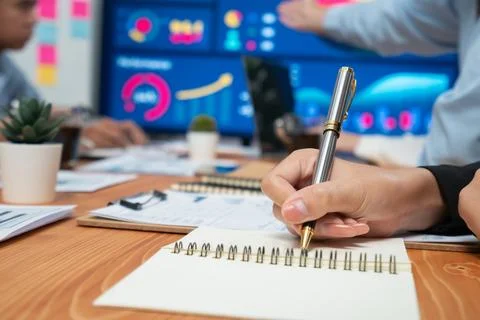 Proactive office worker participating in productive business meeting. Habiliment Stock Photos