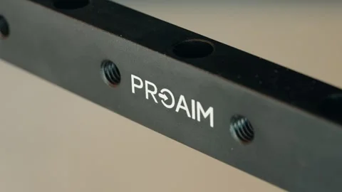 Proaim Logo on Metal Mounting Bar with Threaded Holes Stock Footage 342683237