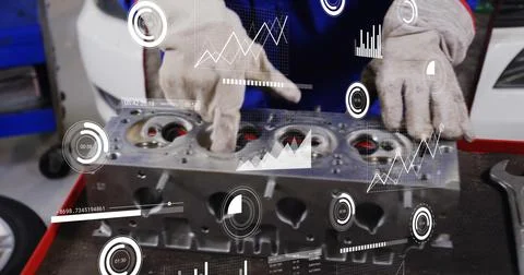 Probing tech in blue coveralls with gray gloves inspecting engine cylinder head Stock Photos