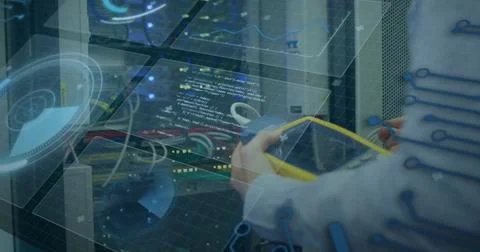 Probing tech hands testing connectors in server rack, light long sleeve, yellow Stock Photos
