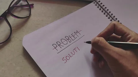 Problem and Solution Concept in Notebook Writing Business Solution Strategy. Stock Footage 329184975