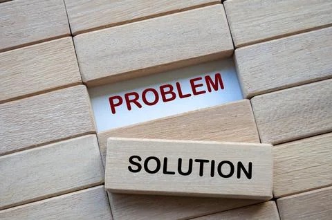 Problem and Solution text on wooden blocks representing problem solving bus.. Stock Photos