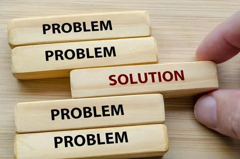 Problem and Solution text on wooden blocks representing shifting from const.. Stock Photos