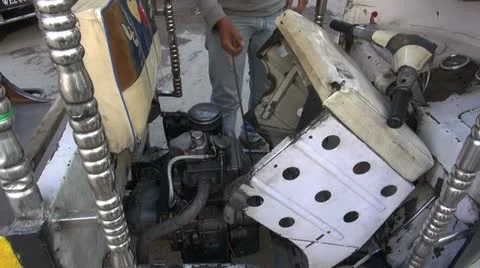 Problem with auto rickshaw engine in Jodphur,India Stock Footage 21310317