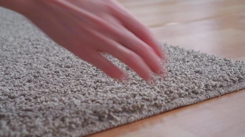 Problem with the carpet,wet floor under the carpet Stock Footage 119274449
