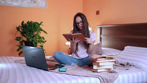 Problem of choice between book and smartphone, browsing internet or education Stock Footage 133446240