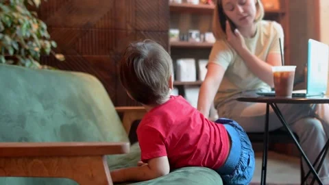 The problem of combining motherhood and work Stock Footage 329599487