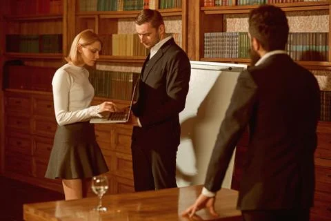 Problem concept. Business people work on problem solution. Woman and men discuss 写真素材