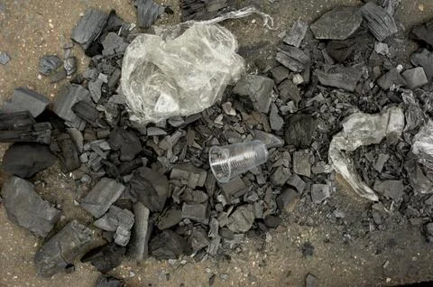 The problem of ecology, forest fires and plastic pollution, disposable tableware Foto stock