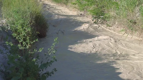 The problem of environmental pollution. Plants dump their waste into the river Stock Footage 103586278