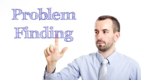 Problem Finding -  Young businessman with small beard touching text Stock Photos