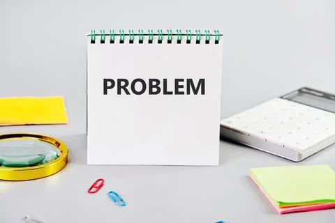 PROBLEM the inscription on the notebook on a gray background next to the st.. Stock Photos