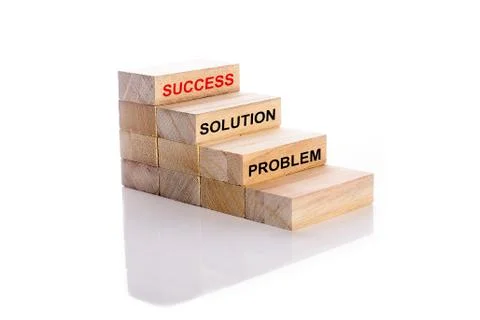 Problem, solution and success words on wooden cubes stack. Step to success in Stock Photos