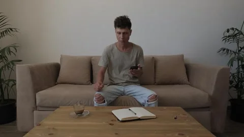 Problem solving and decision making at home, man checks unexpected information Stock-Footage 346253097