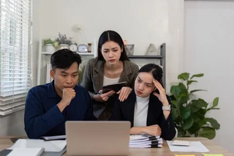 Problem Solving and Team Dynamics. Team members focused on addressing challenges Stock Photos