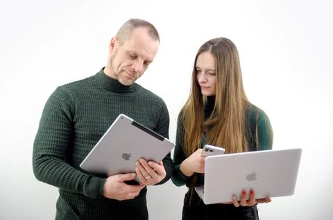 Problem solving communication man and woman using apple technology business 写真素材