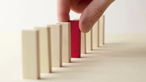 Problem solving concept. Business risks. Wooden blocks of dominoes. Stock Footage 227030243