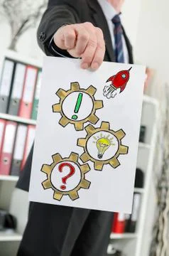 Problem solving concept shown by a businessman Stock Photos