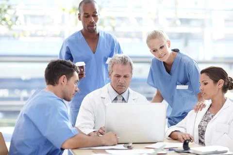 Problem solving - Healthcare professionals at work. A team of medical Stock Photos