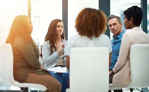 Problem solving. How the pros do it. a team of colleagues having a meeting in a Fotos de archivo