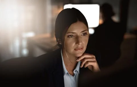 Problem solving, night work and woman in office reading report, email or Stock Photos