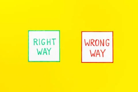 Problem solving. Right and wrong way icons on work desk from above 스톡 사진